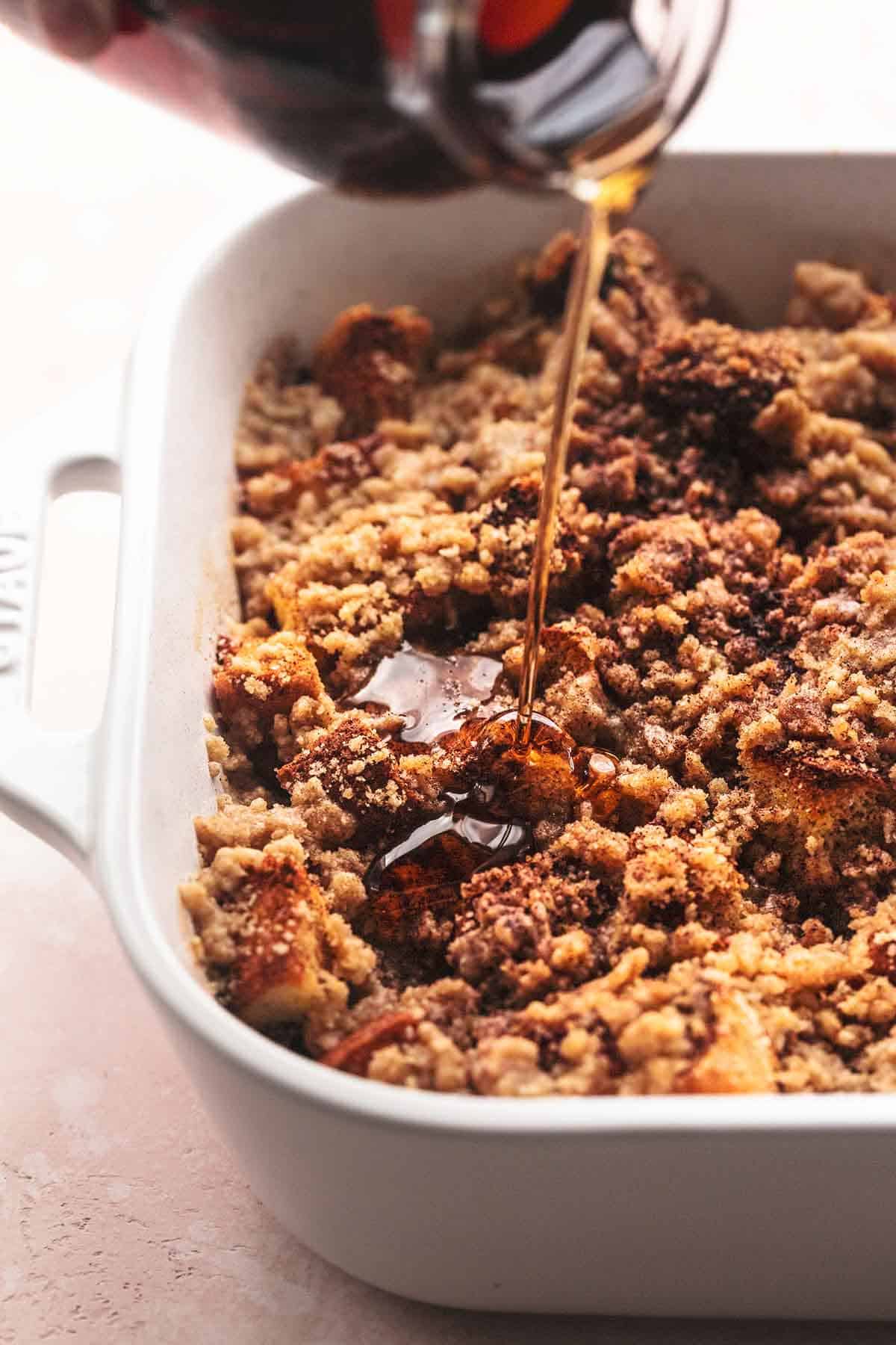 close up of syrup drizzling onto French toast casserole.