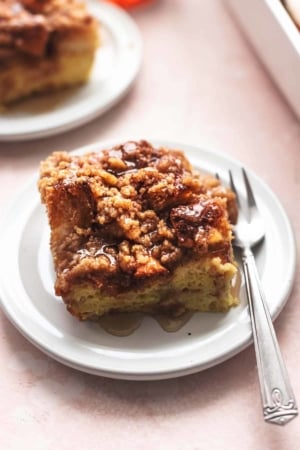 french toast square with syrup bottle and baking dish