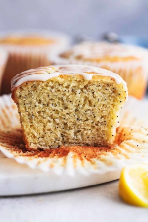 up close view of cross section of lemon poppy seed muffin