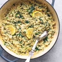 overhead view of pasta and lemons in skillet