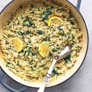 overhead view of pasta and lemons in skillet
