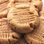stacked peanut butter cookies on plate