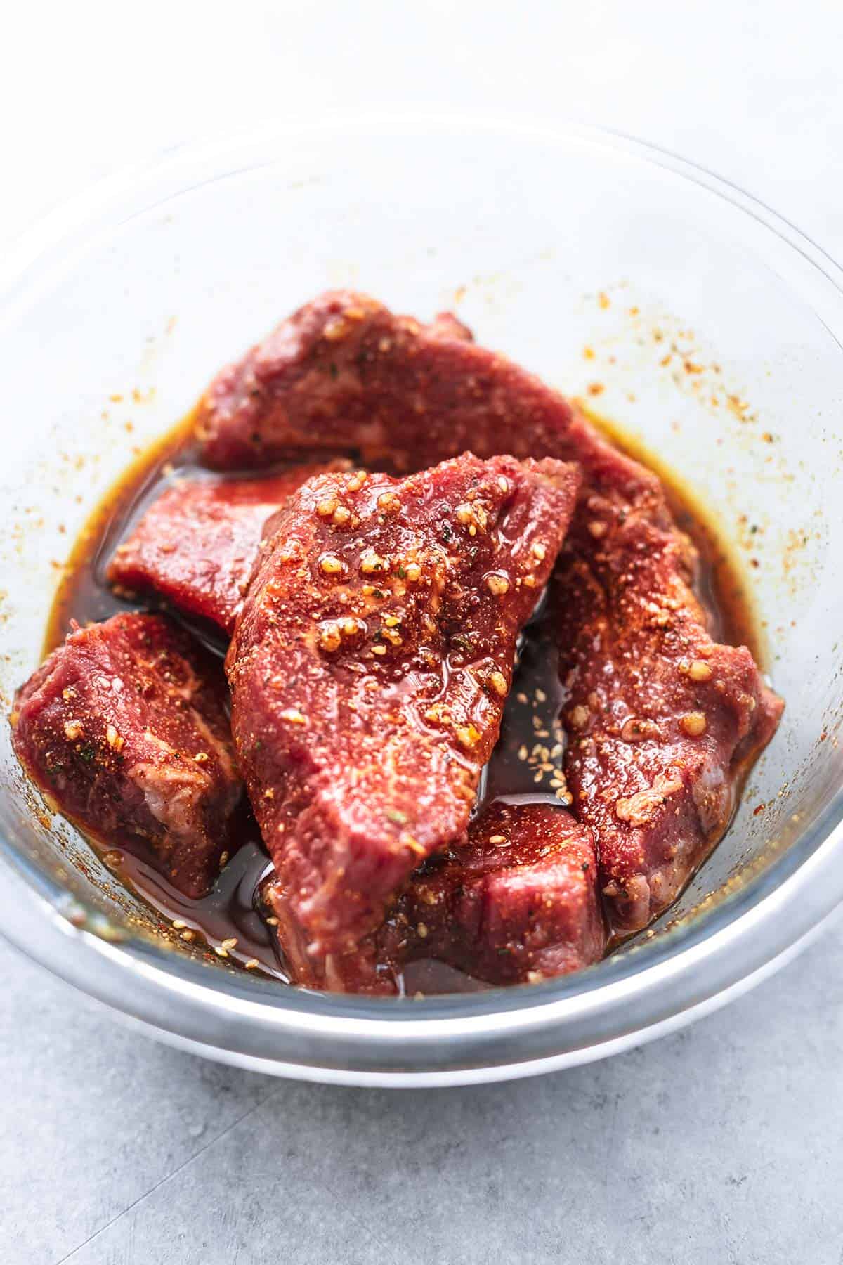 marinating beef in bowl