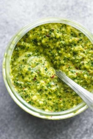 chimichurri sauce in bowl with spoon