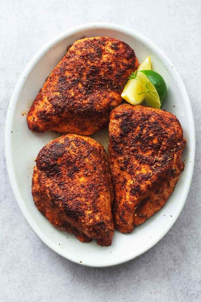 plate of three baked chicken breasts