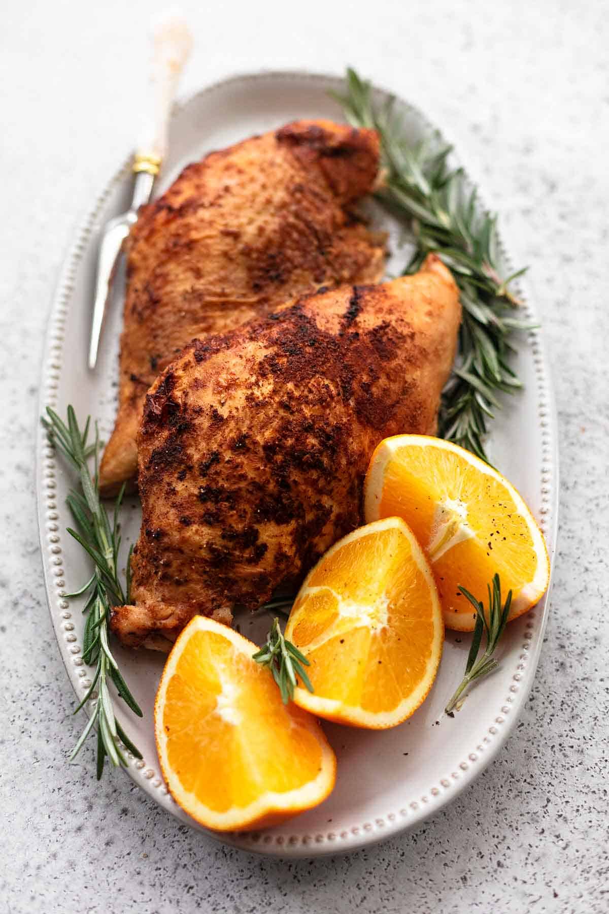 cooked turkey breast on serving platter