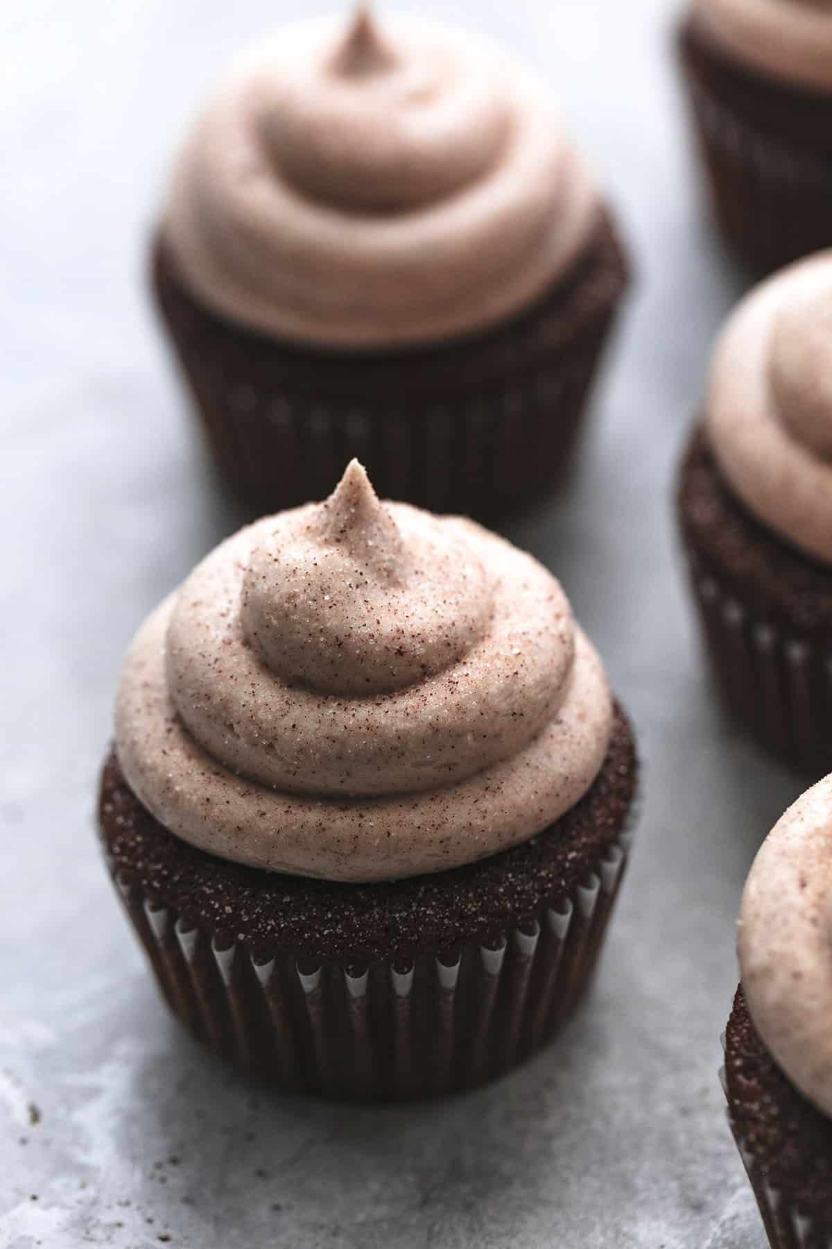 row of frosted gingerbread cupcakes
