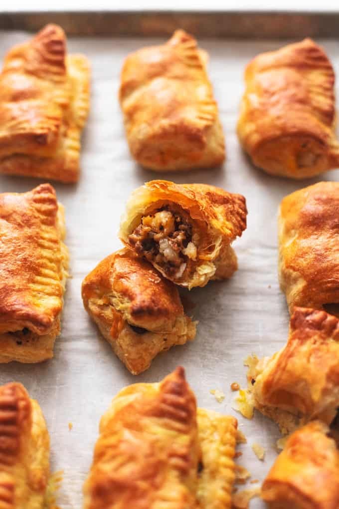 pan of sausage rolls on parchment paper
