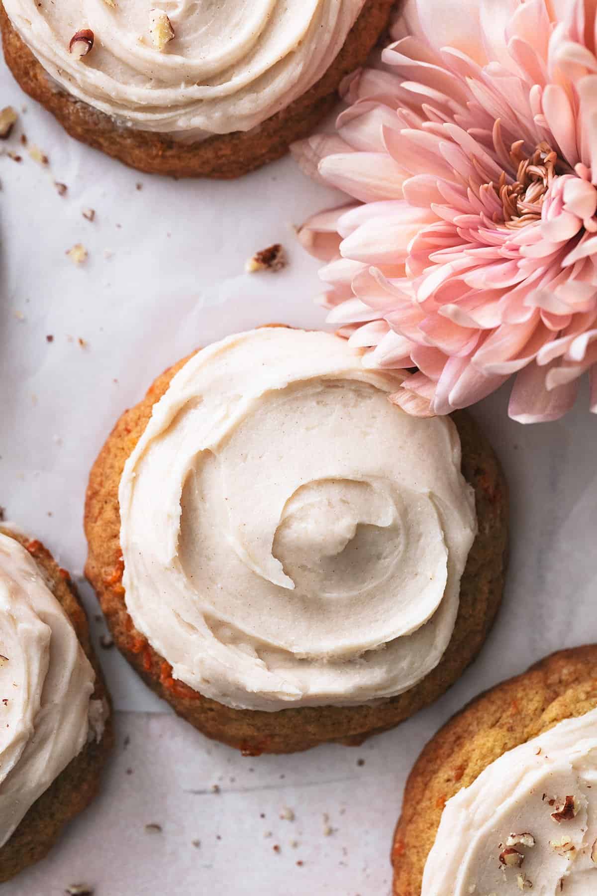 carrot cake cookies with a flower on a table