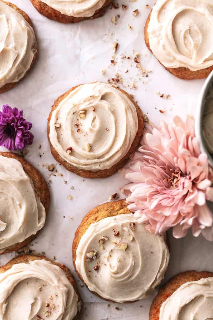 carrot cake cookies on tabletop with flowers