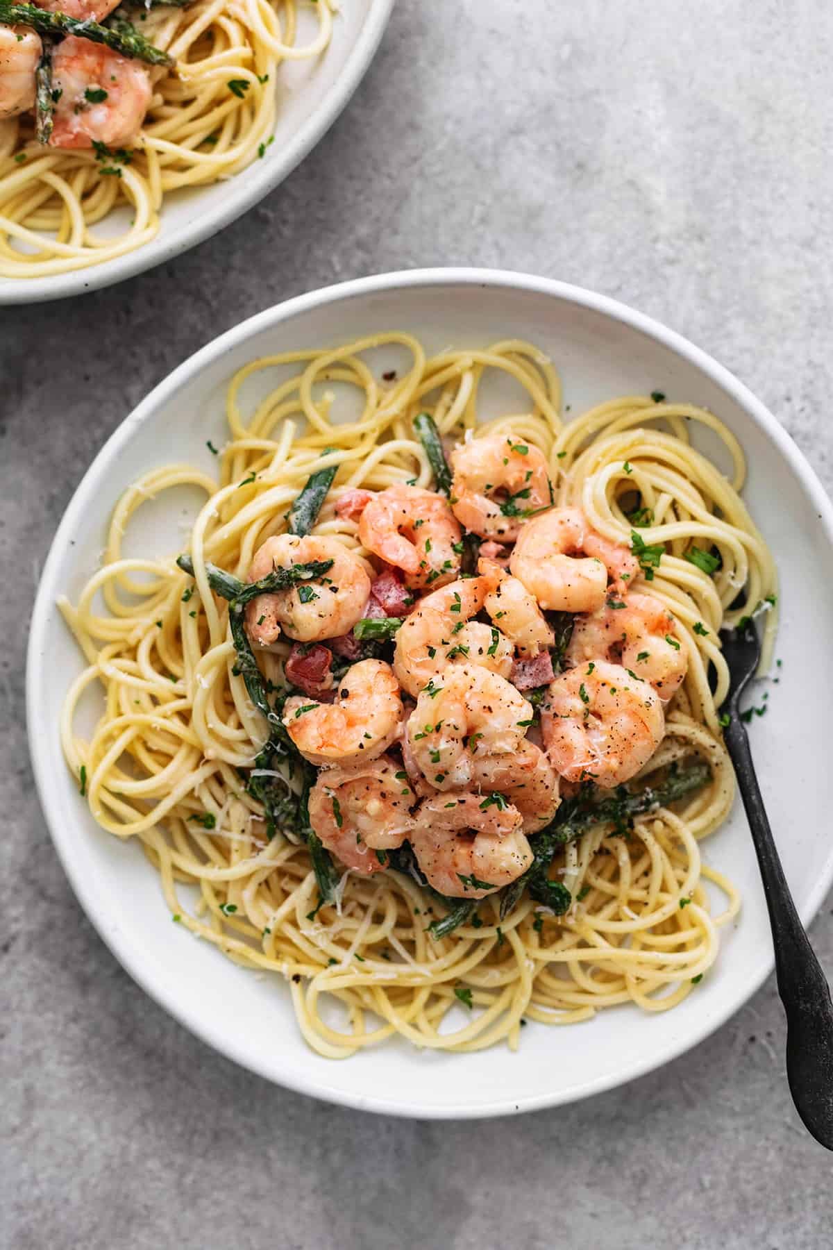 plate of shrimp scampi with fettuccine noodles