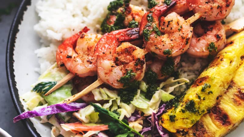 grilled shrimp and pineapple over rice with slaw