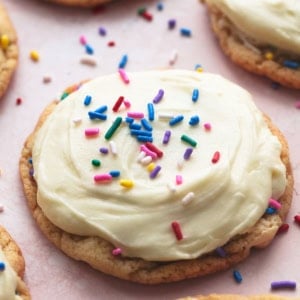 cookie topped with frosting and sprinkles