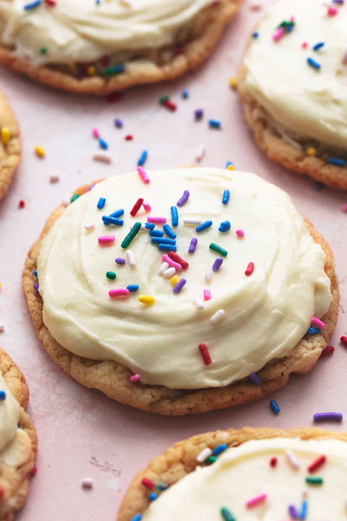cookie topped with frosting and sprinkles