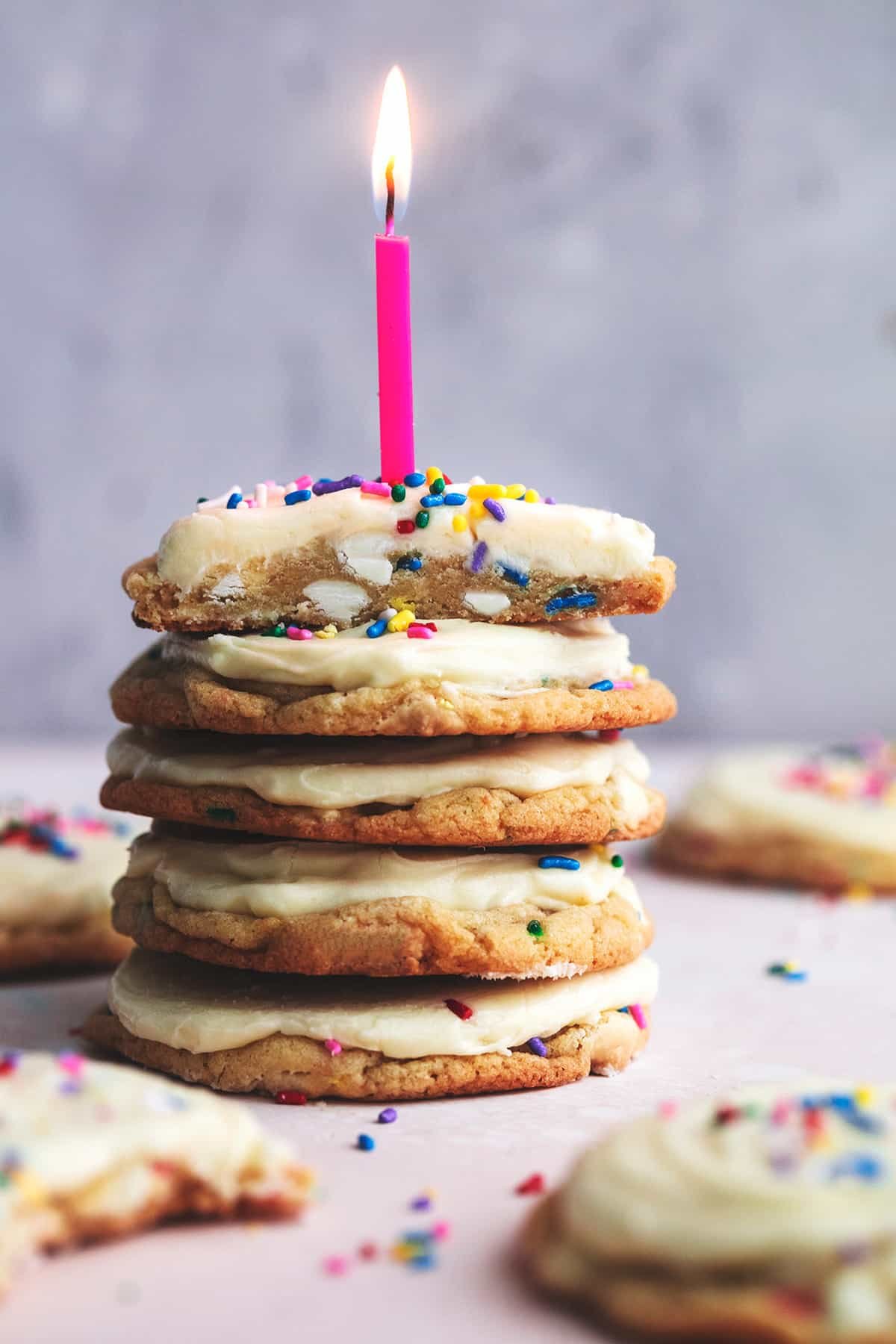 stack of birthday cake batter cookies with candle