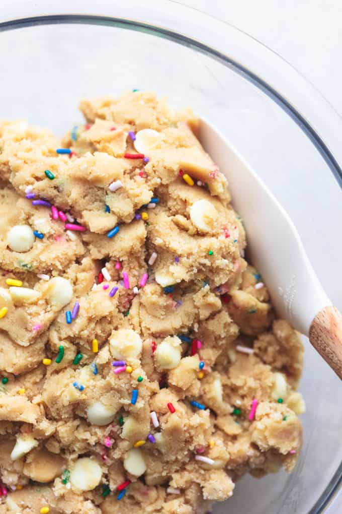 unbaked cookie dough with spatula in bowl