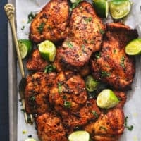 pan of grilled cilantro lime chicken thighs with serving fork