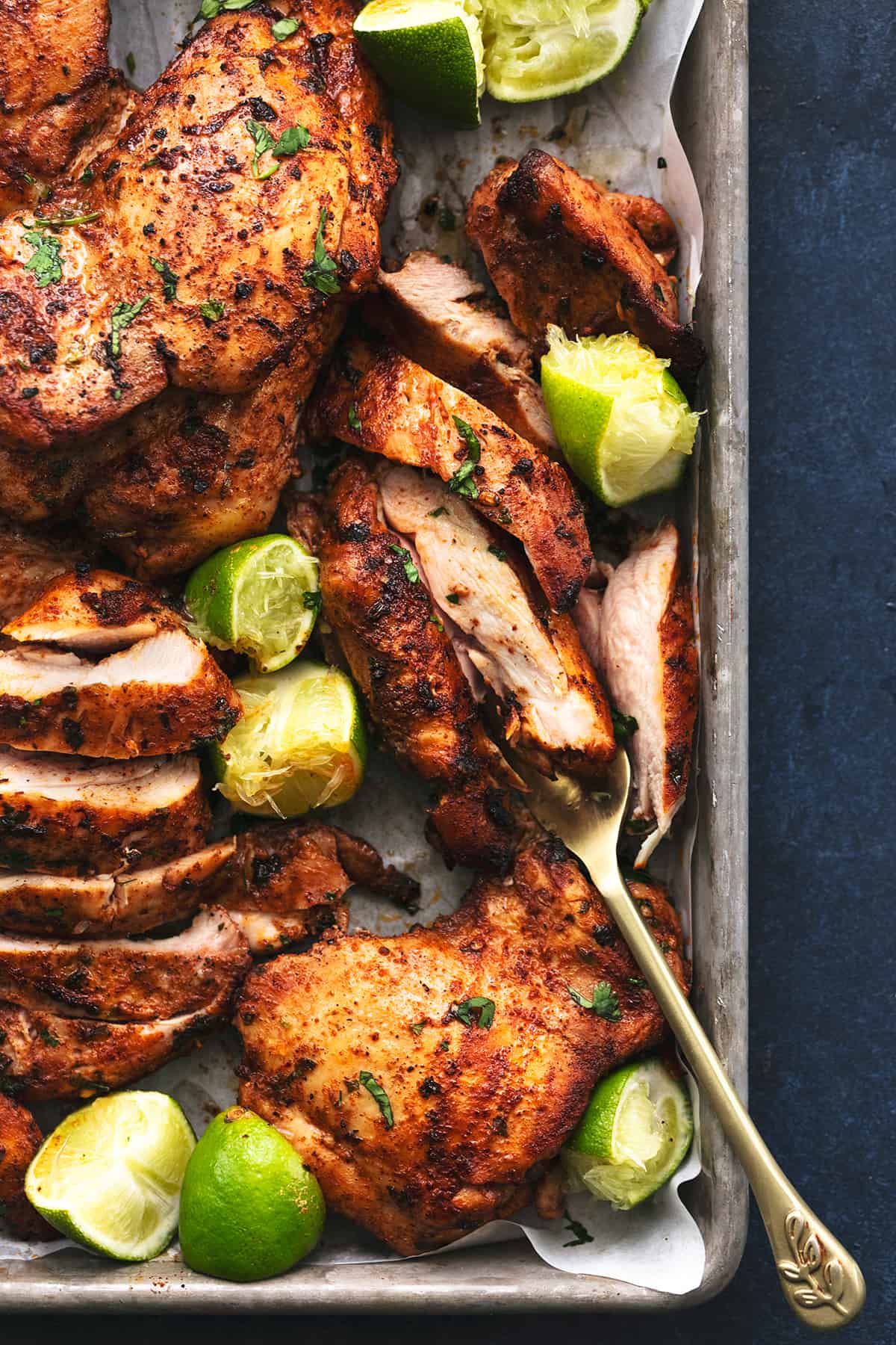 sliced grilled chicken thighs with cilantro and lime