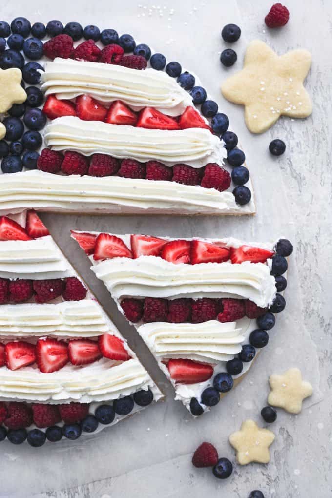 single slice cut out of flag fruit pizza