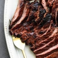 thinly sliced skirt steak with serving fork