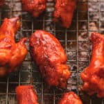 baked buffalo chicken wings on a baking rack