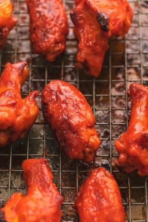 baked buffalo chicken wings on a baking rack