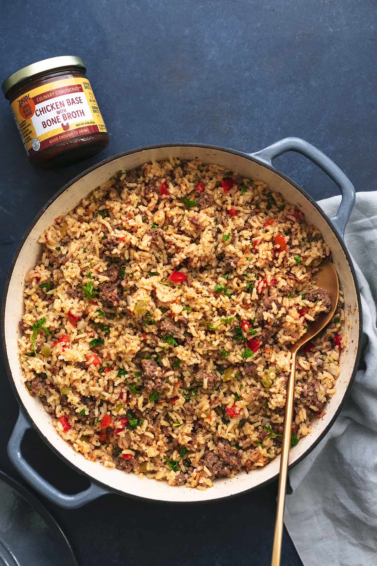 southern dirty rice in skillet with Zoup broth concentrate on side