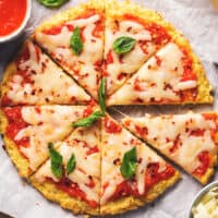 cauliflower crust pizza with cheese and basil