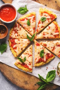cauliflower crust pizza with cheese and basil