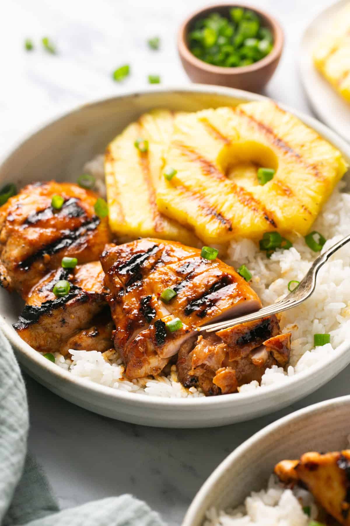 grilled chicken with pineapple on a plate
