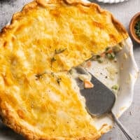 pie server digging into chicken pot pie