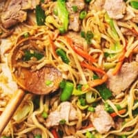pork lo mein with serving spoon