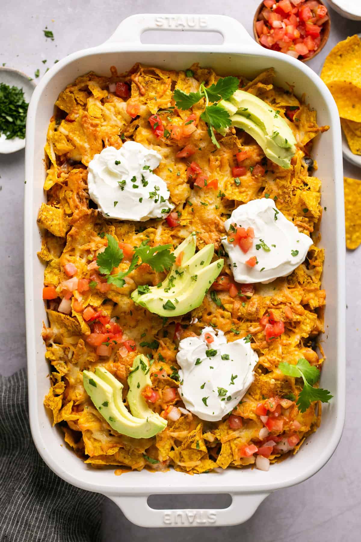 casserole dish of chicken taco casserole with doritos 