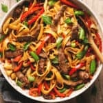 noodles with beef and vegetables in skillet