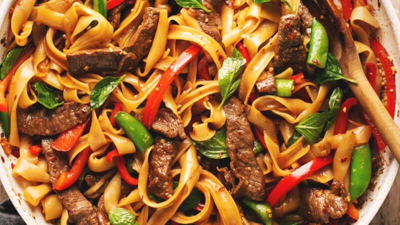 noodles with beef and vegetables in skillet