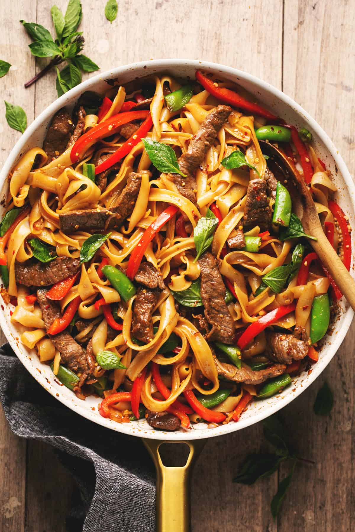 noodles with beef and vegetables in skillet