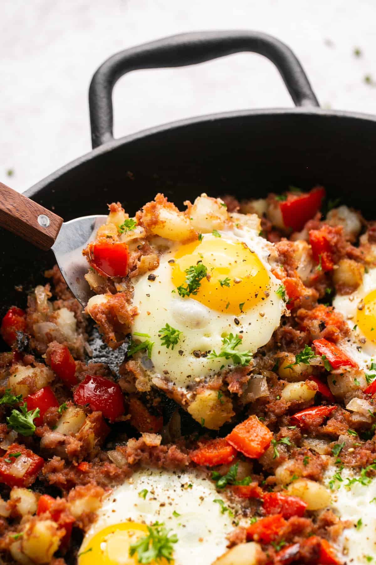 corned beef hash topped with fried eggs