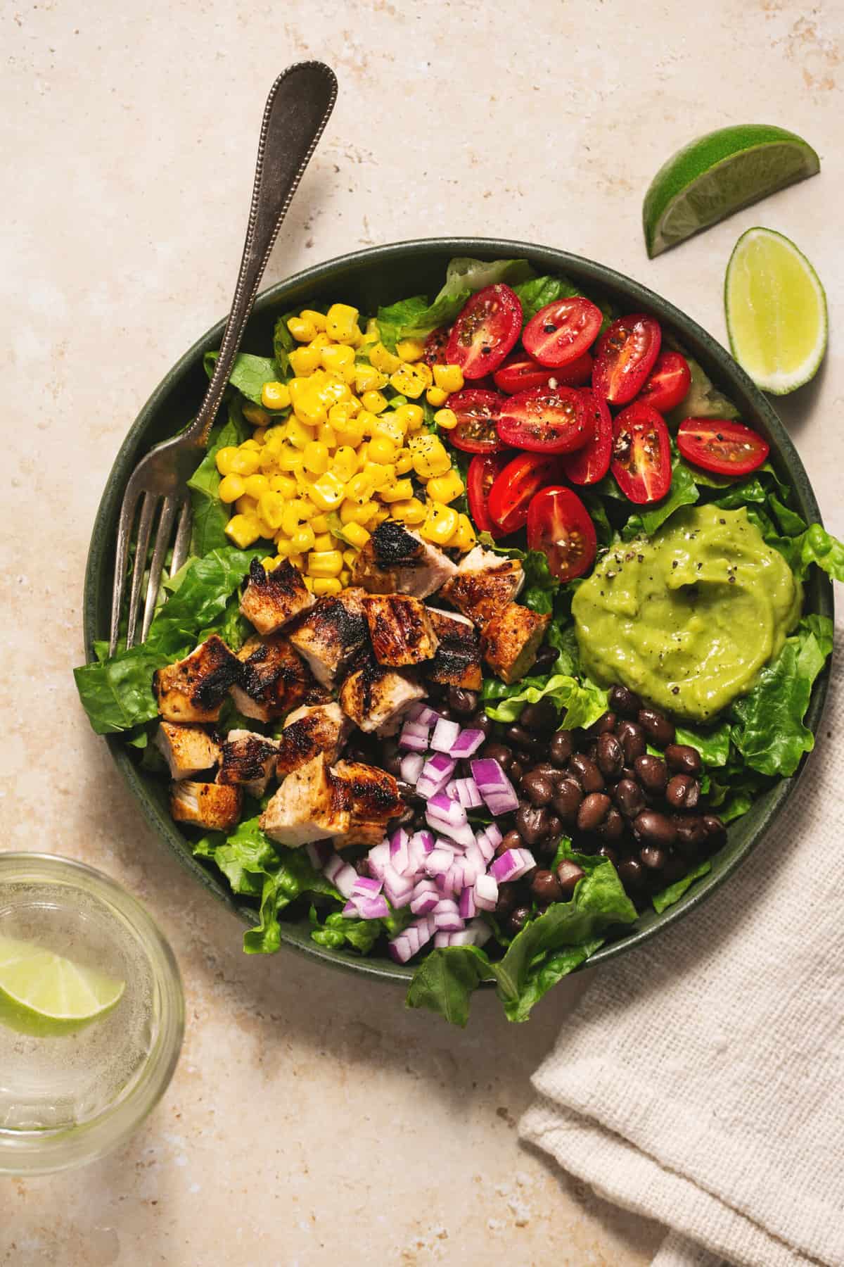 diced grilled chipotle chicken bowl with veggies and guacamole