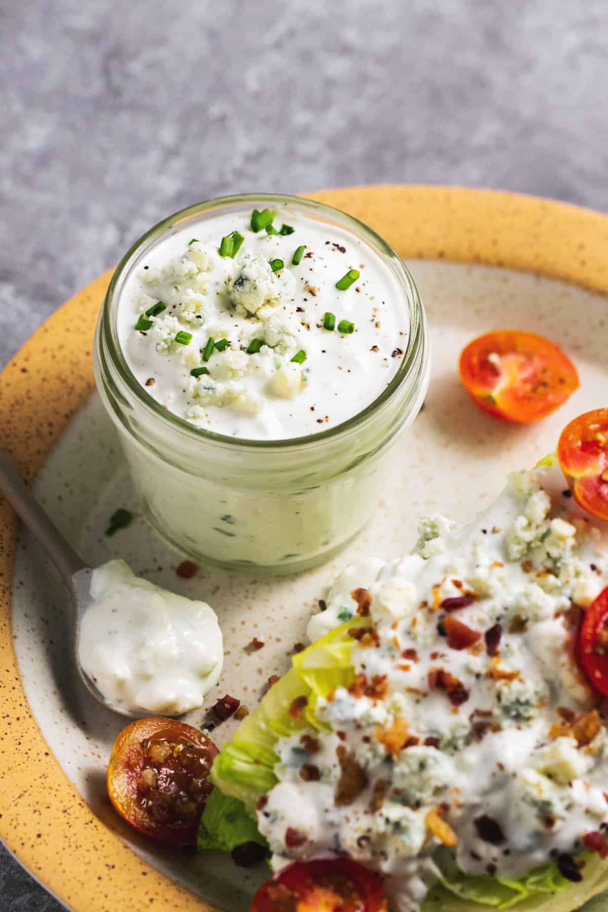 wedge salad with blue cheese dressing and tomatoes