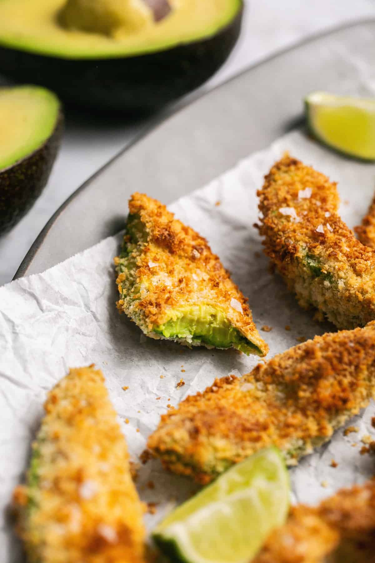 up close view of crispy avocado bites with breading