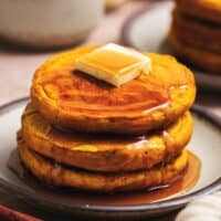 stack of pumpkin pancakes on plate