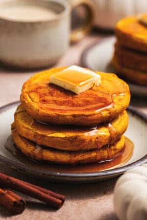 stack of pumpkin pancakes on plate