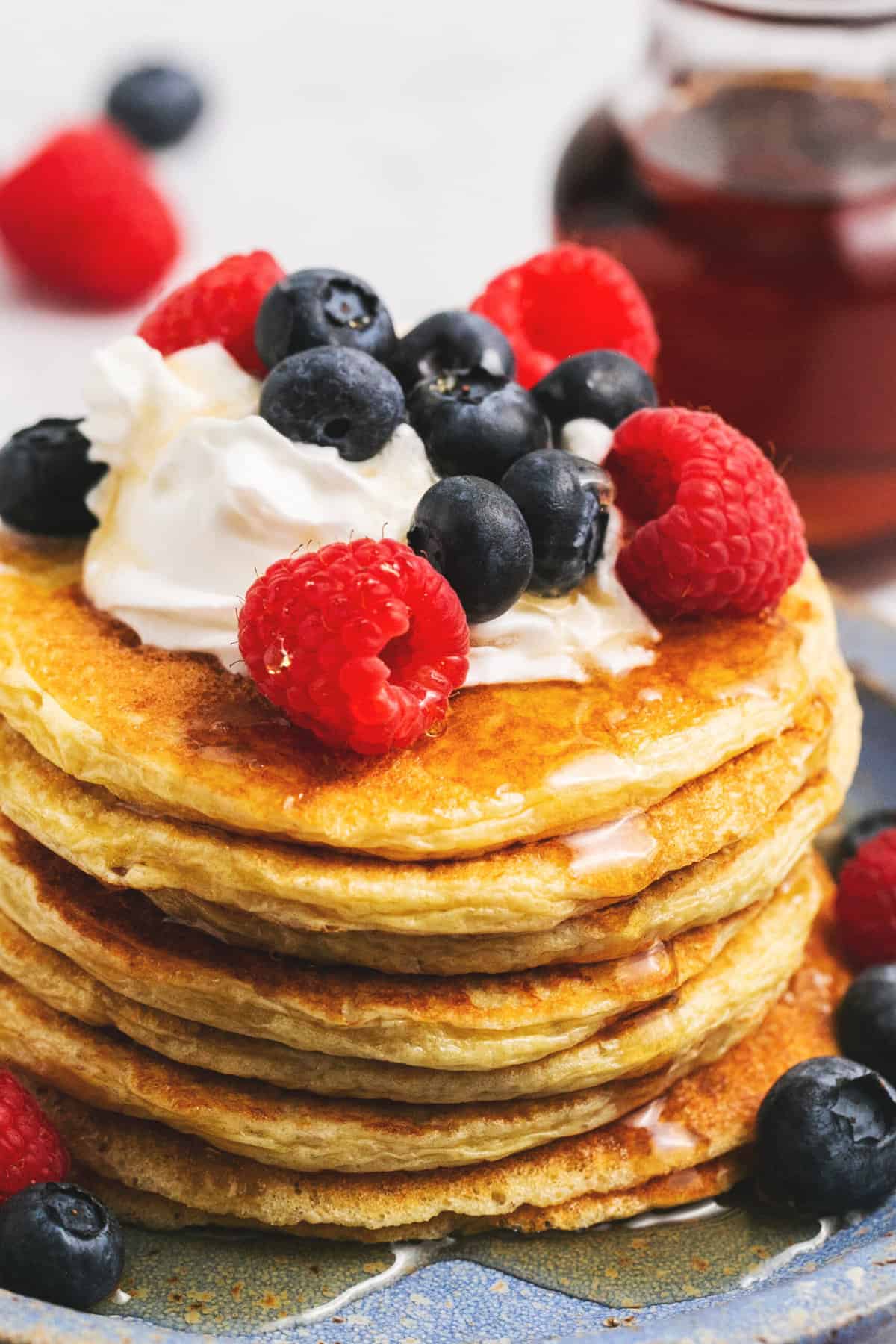 cottage cheese pancakes stacked on a plate