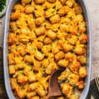 cheesy tater tot casserole in baking dish on tabletop
