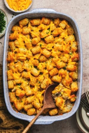 cheesy tater tot casserole in baking dish on tabletop