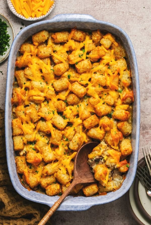 cheesy tater tot casserole in baking dish on tabletop