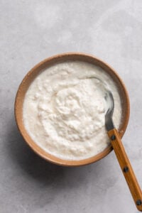 bowl of horseradish cream sauce for prime rib with spoon