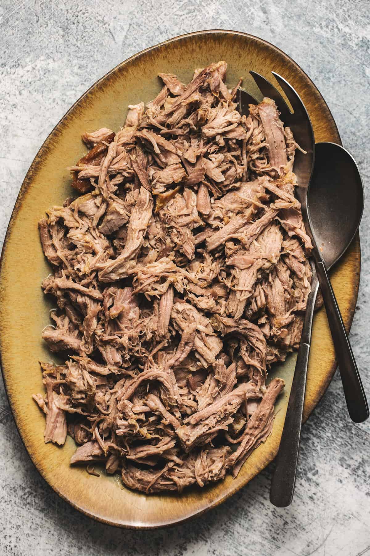 platter of shredded hawaiian pork with serving spoon