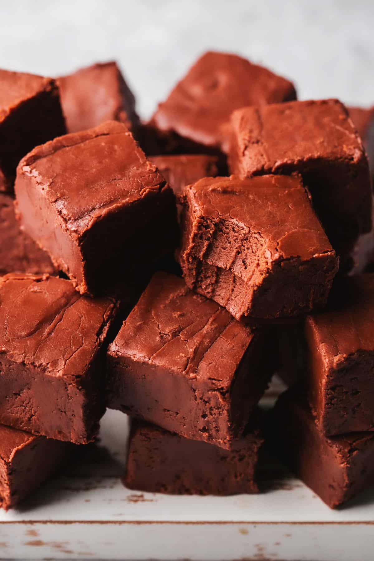 fudge pieces with one bite taken from a single piece