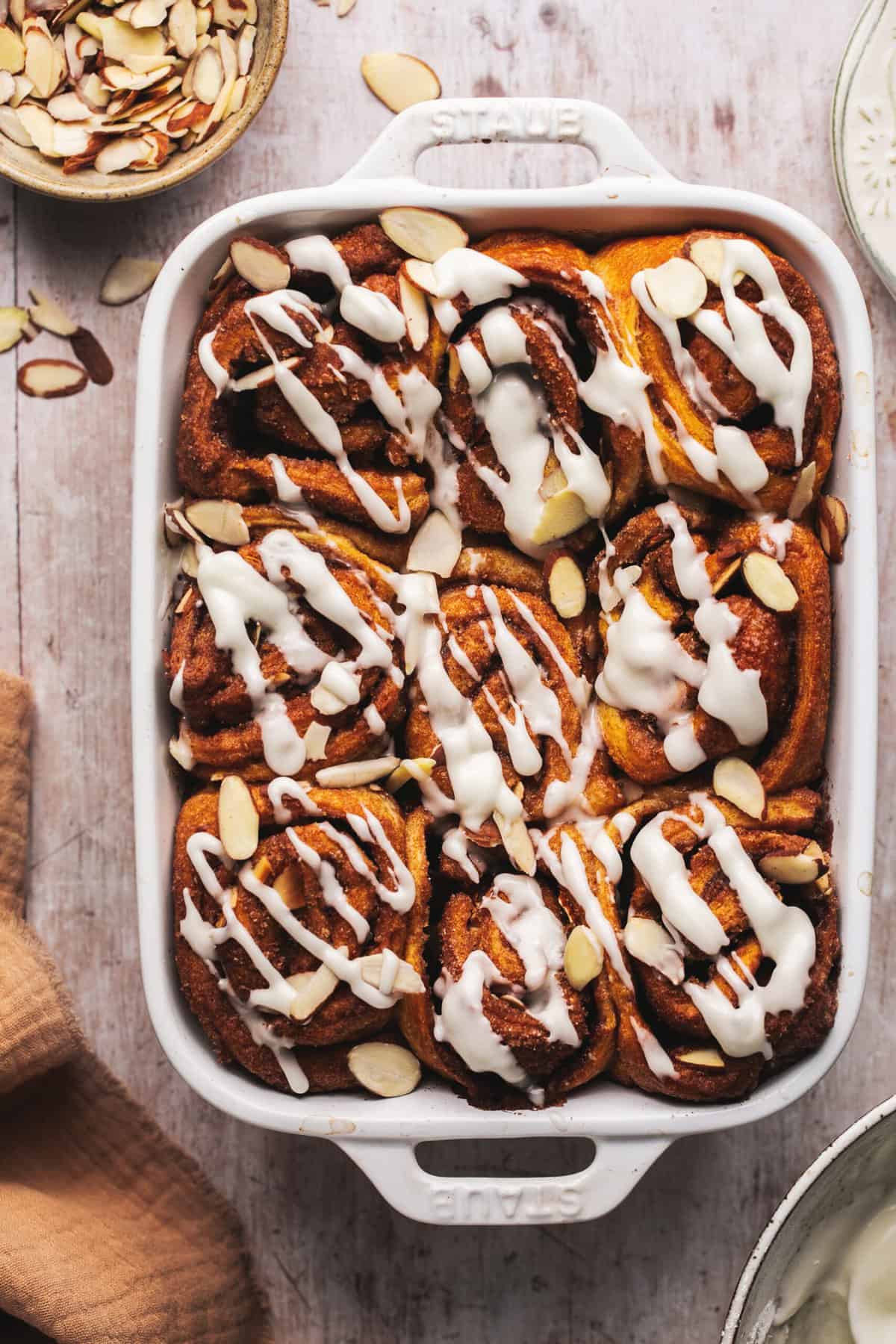 overhead view of cinnamon buns in casserole dish